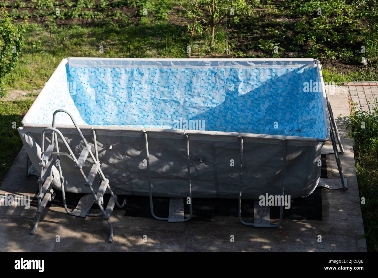empty pool in the yard Stock Photo - Alamy