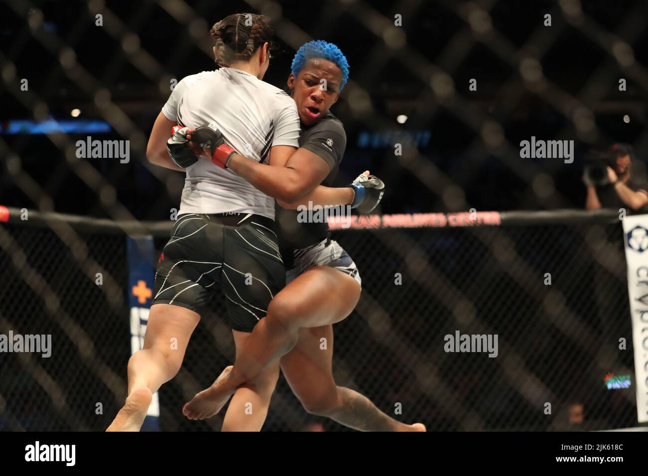 Dallas, Texas, Dallas, TX, USA. 30th July, 2022. DALLAS, TX - JULY 30: (R-L) Joselyne Edwards takes down Ji Yeon Kim in their Women's Bantamweight bout during the UFC 277 event at American Airlines Center on July 30, 2022, in Dallas, Texas, United States. (Credit Image: © Alejandro Salazar/PX Imagens via ZUMA Press Wire) Stock Photo