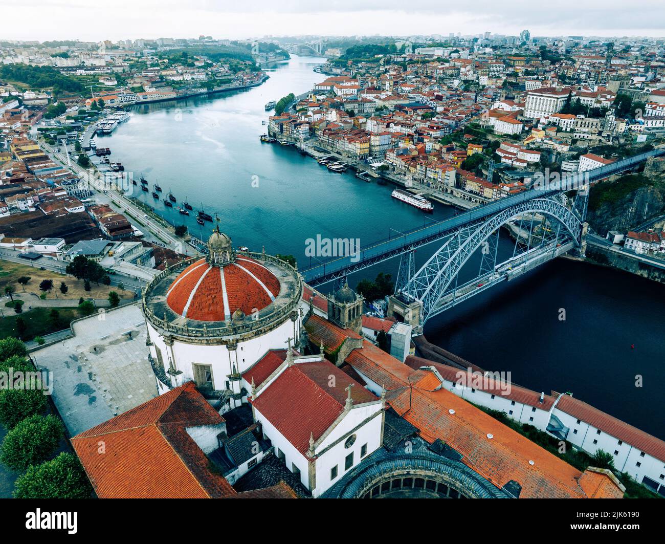 Porto Portugal Aerial View. Dom Luis Bridge at Sunrise. Porto, Portugal. Cityscape of Downtown Touristic Ribeira. Olt Town. Douro River. - Stock Image