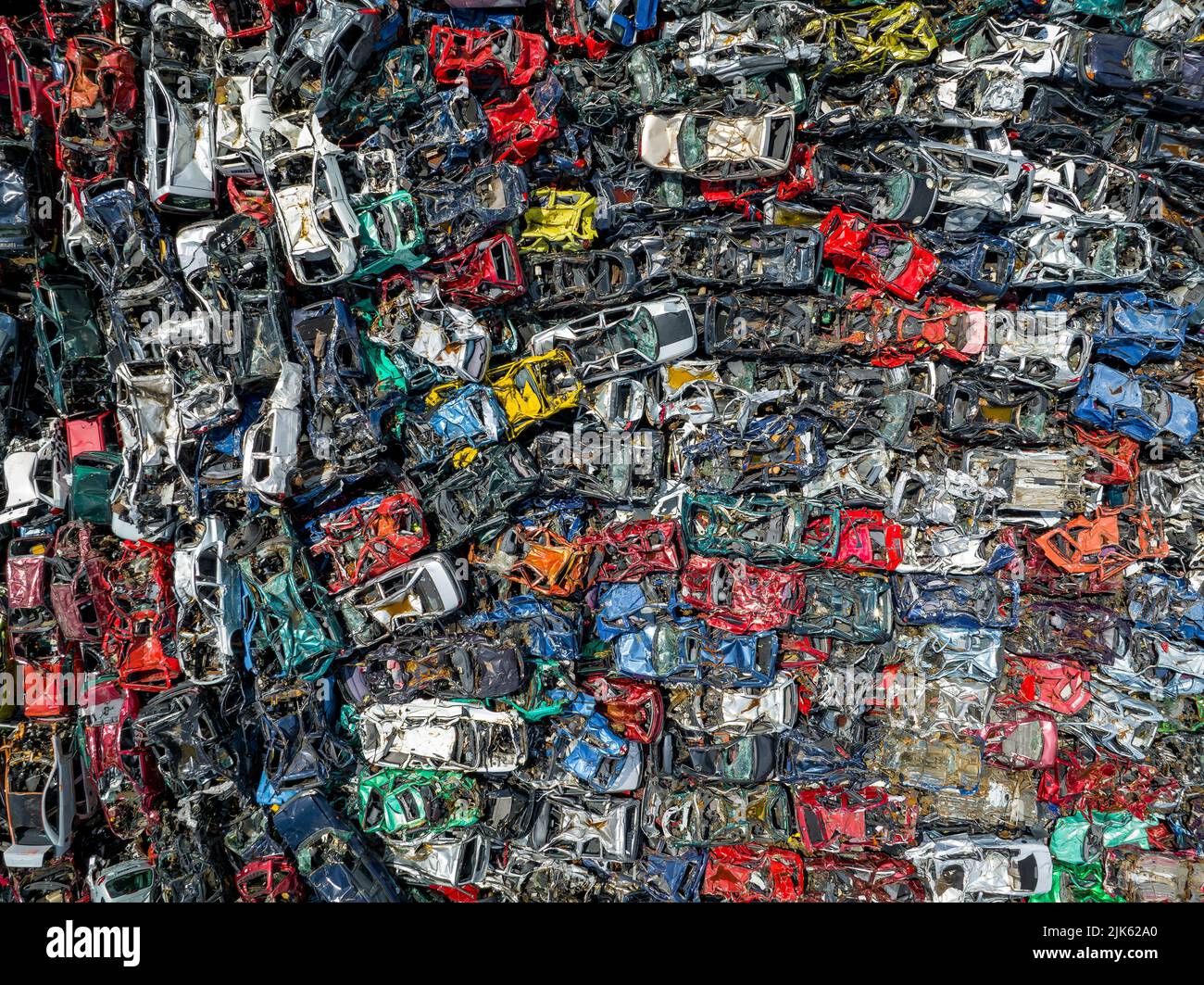 Junkyard Abandoned Cars Aerial View. Top Down View. Vehicle Demolition. Car Dump. Industrial Aerial Background. - Stock Image
