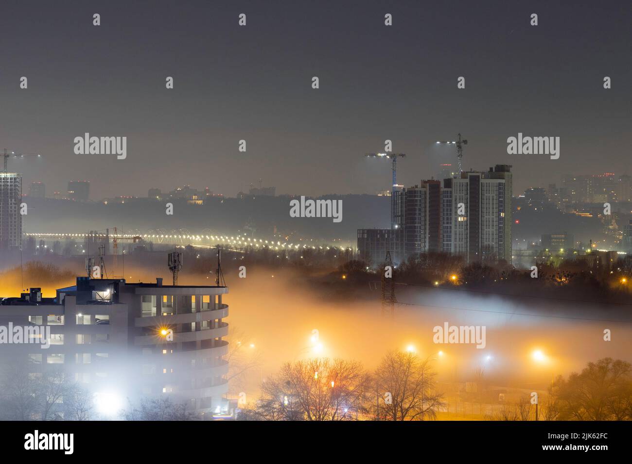 Night cityscape of the big city. Awesome bright, multi colored light in ...