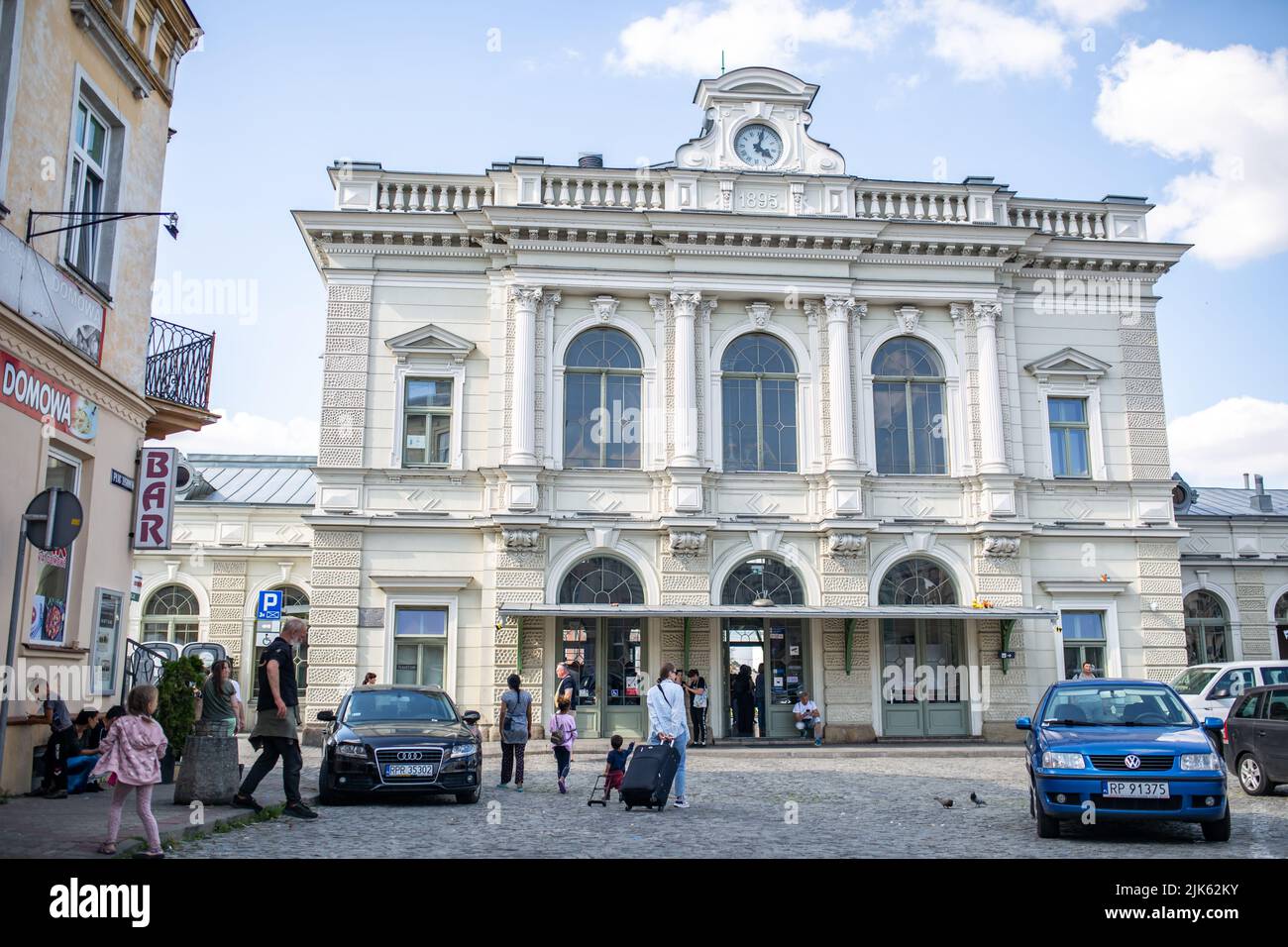 Przemysl, Poland - July 24, 2022: Unidentified people in front of Main Train Station in Przemysl, Poland. Stock Photo