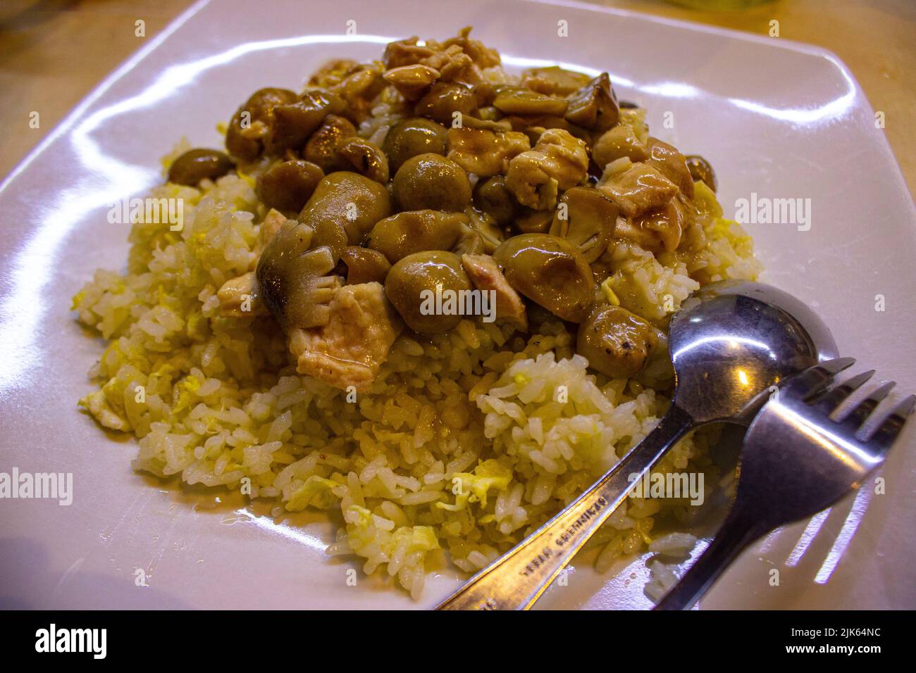 Hainanese chicken rice or or hainan rice or nasi ayam hainan served ...