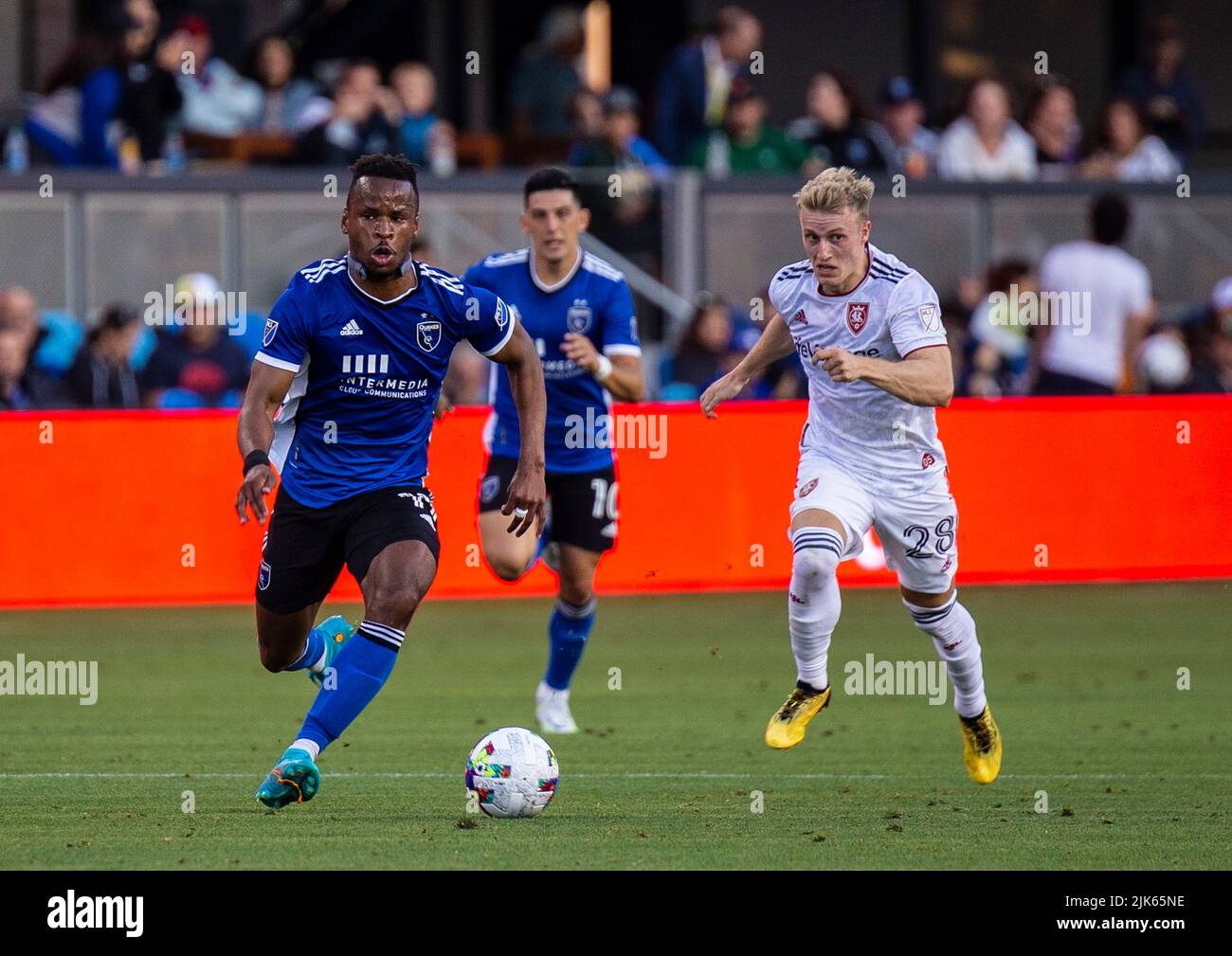 San Jose, California, USA. July 30, 2022 San Jose, CA USA San Jose Earthquakes forward Jeremy Ebobisse (11) kicks the ball upfield away from RSL defender Jasper LÃ¶ffelsend (28) during the MLS game between Real Salt Lake and the San Jose Earthquakes. The game ends 2-2 tie at PayPal Park San Jose Calif. Thurman James/CSM Credit: Cal Sport Media/Alamy Live News Stock Photo