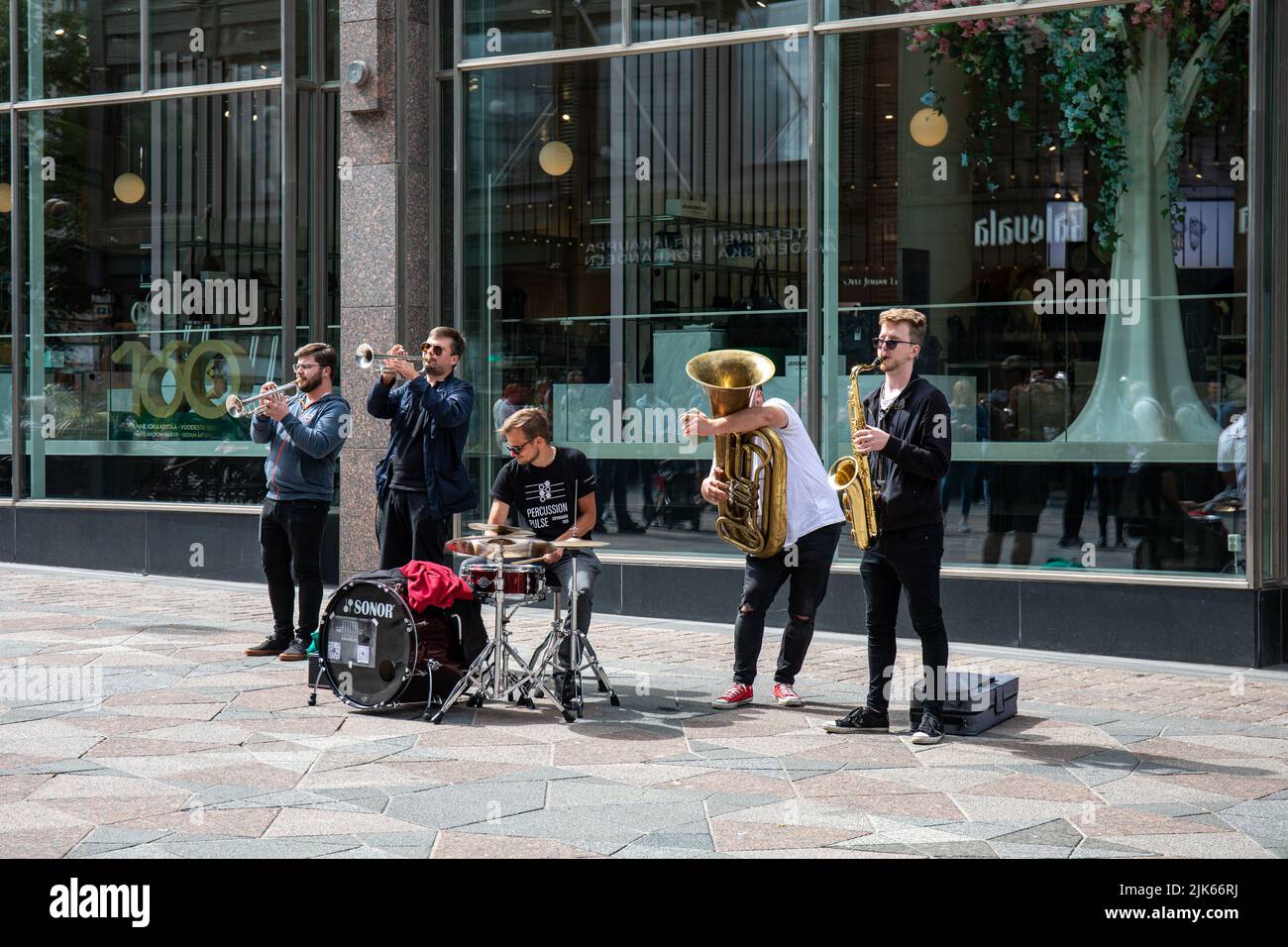 The Radioators LV, a Latvian brass band playing in Keskuskatu, Helsinki, Finland Stock Photo