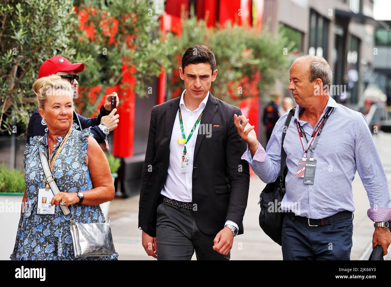 Budapest, Hungary. 31st July, 2022. (L to R): Tina Westcott with James Hughes Mulligan (GBR) Formula 1 Race Promotion, Senior Commercial Manager, and Andrew Wesatcott (AUS) Australian Grand Prix Corporation Chief Executive Officer. Hungarian Grand Prix, Sunday 31st July 2022. Budapest, Hungary. Credit: James Moy/Alamy Live News Stock Photo