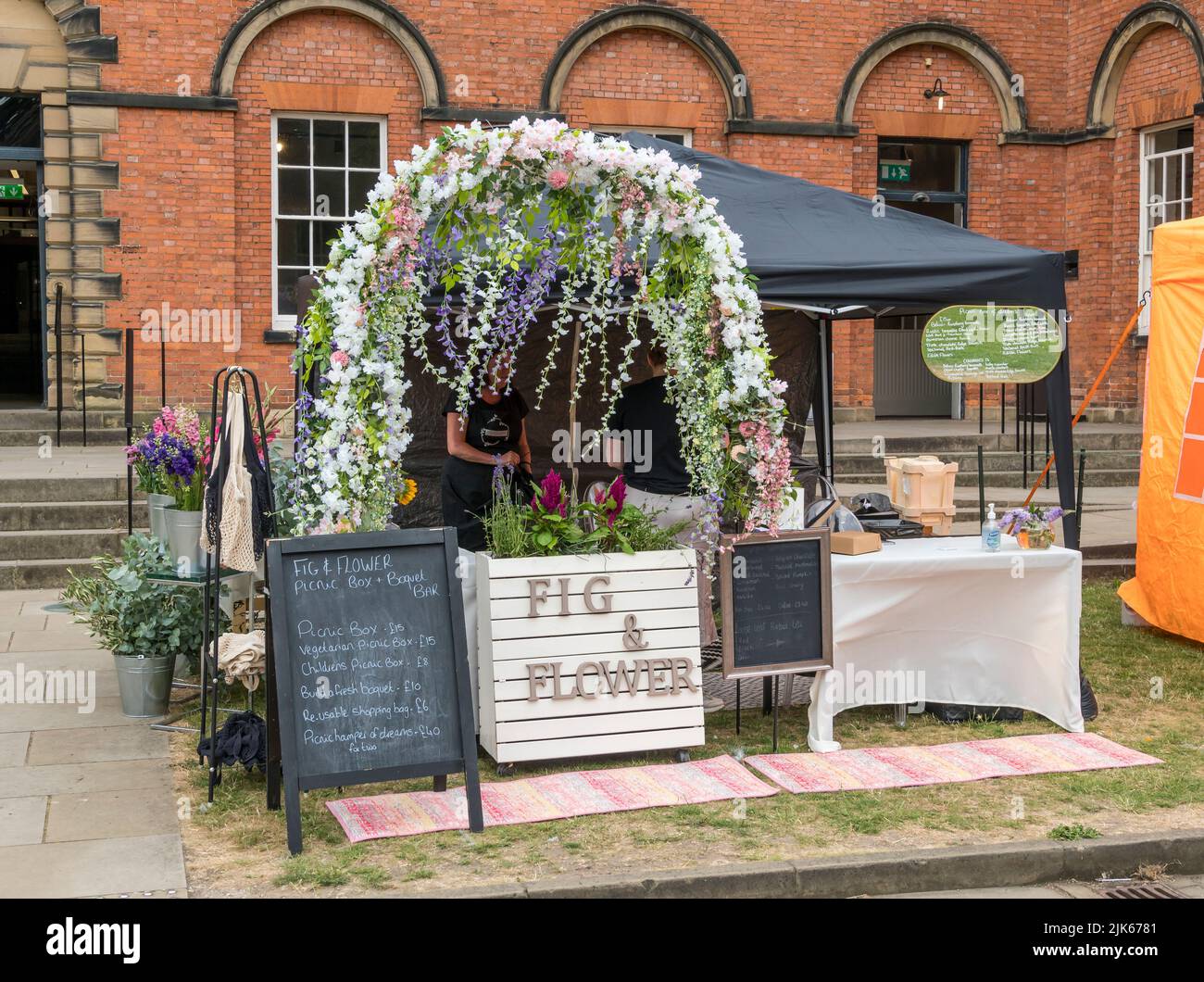 Fig and Flower picnic box stand at Picnic Social in grounds of Lincoln Castle Lincolnshire 23rd july 2022 Stock Photo