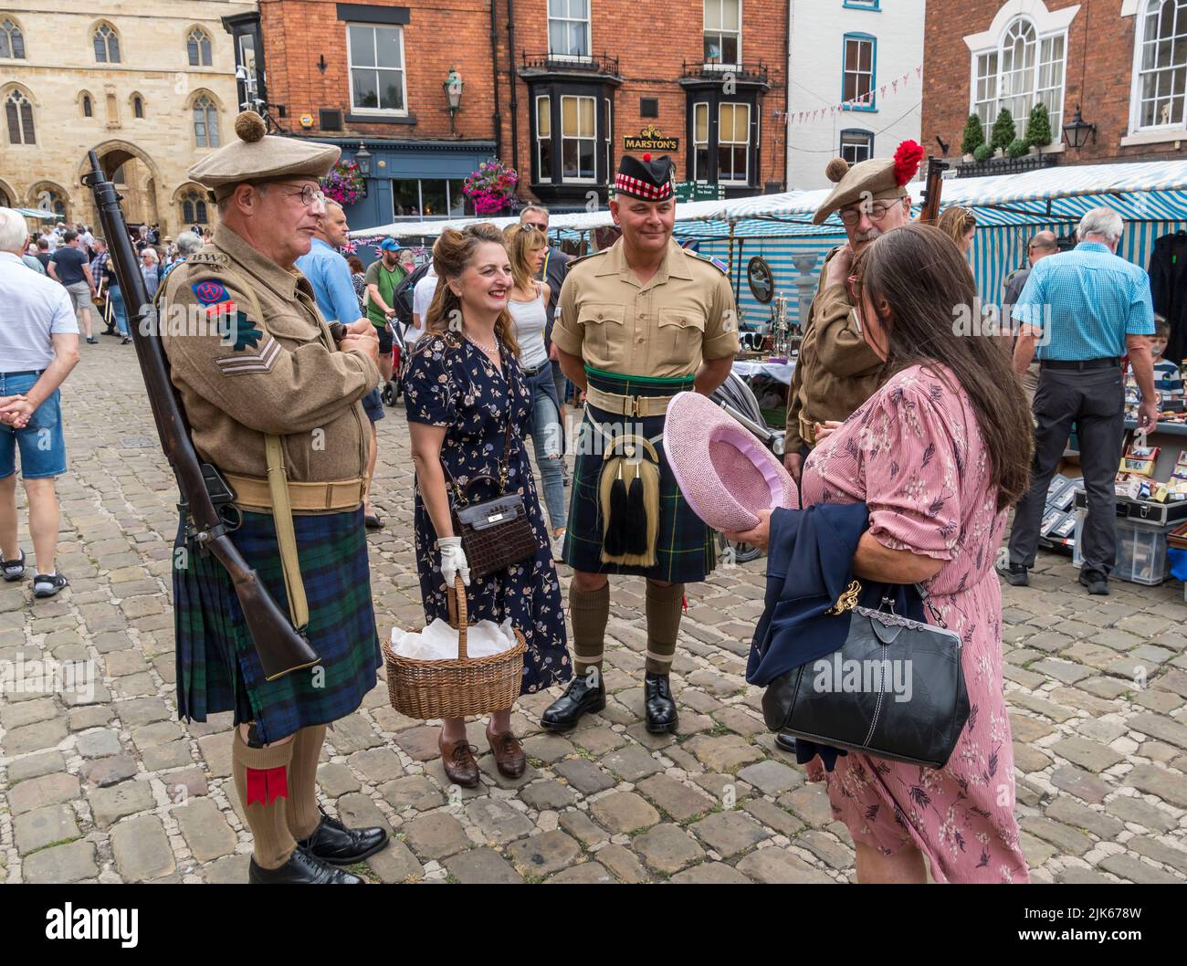 Gentlemen in Scottish army dress at Lincoln 1940's weekend, Lincoln Cathedral Quarter, 23rd July 2022 Stock Photo