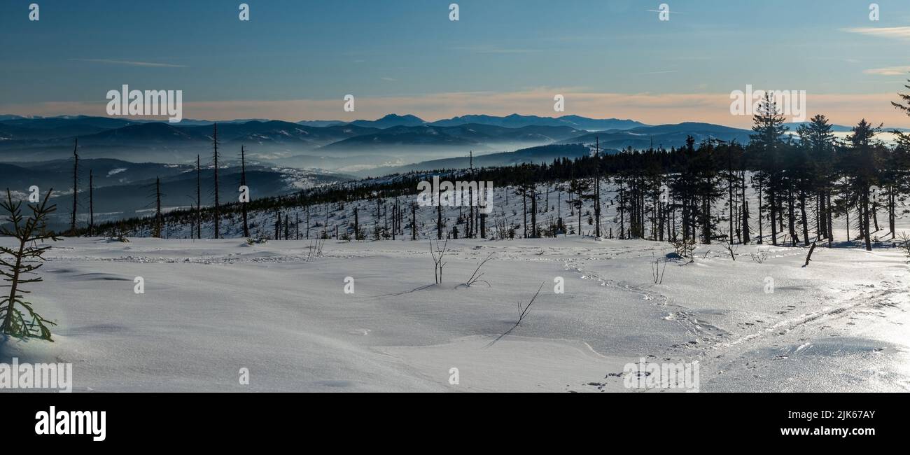 Amazing view from Wierch Wiselke near Barania Gora hill summit in Beskid Slaski mountains in Poland during beautiful winter day Stock Photo