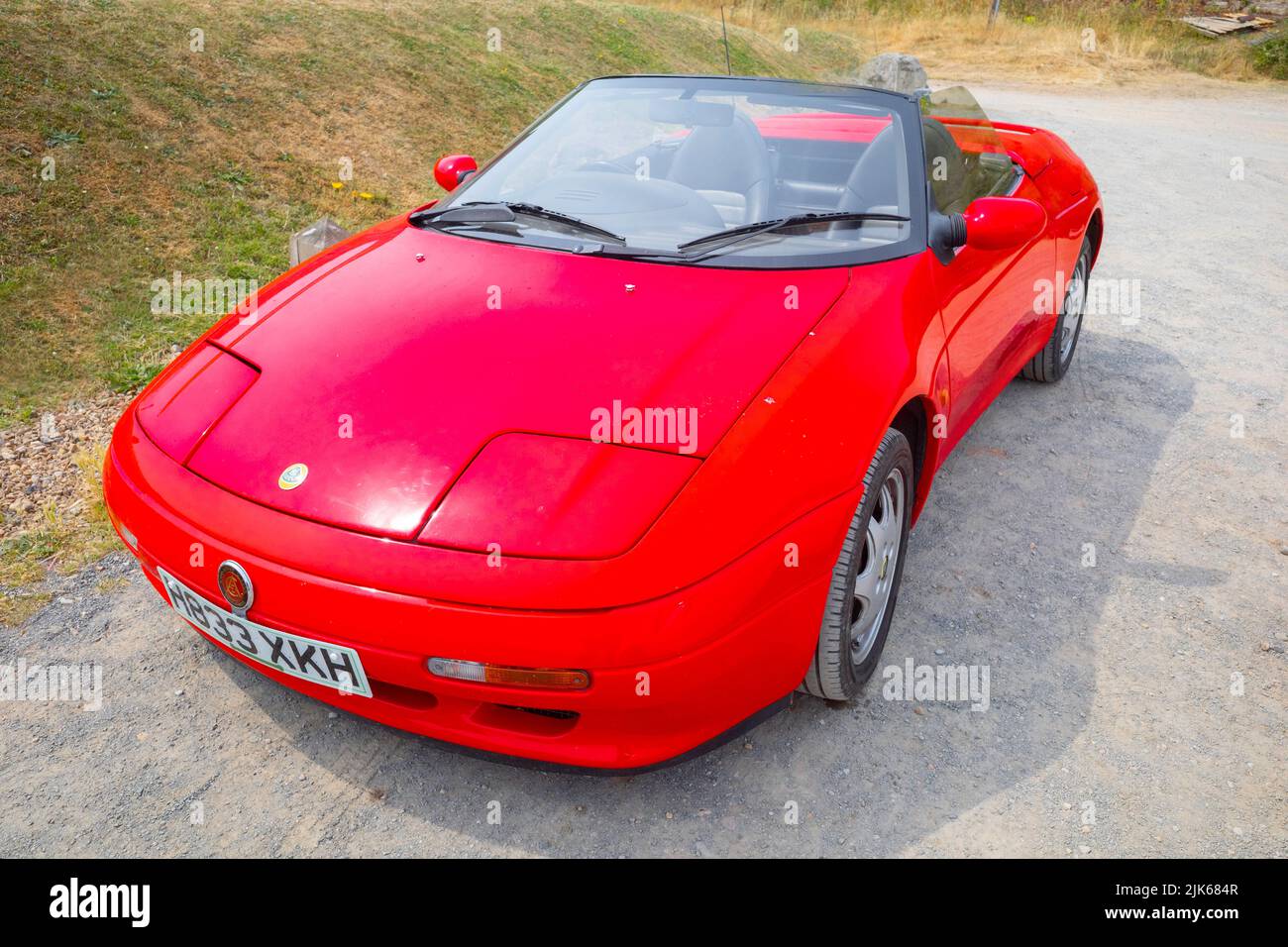 Red 1990 registered Lotus Elan SE sports car in North Yorkshire Stock Photo