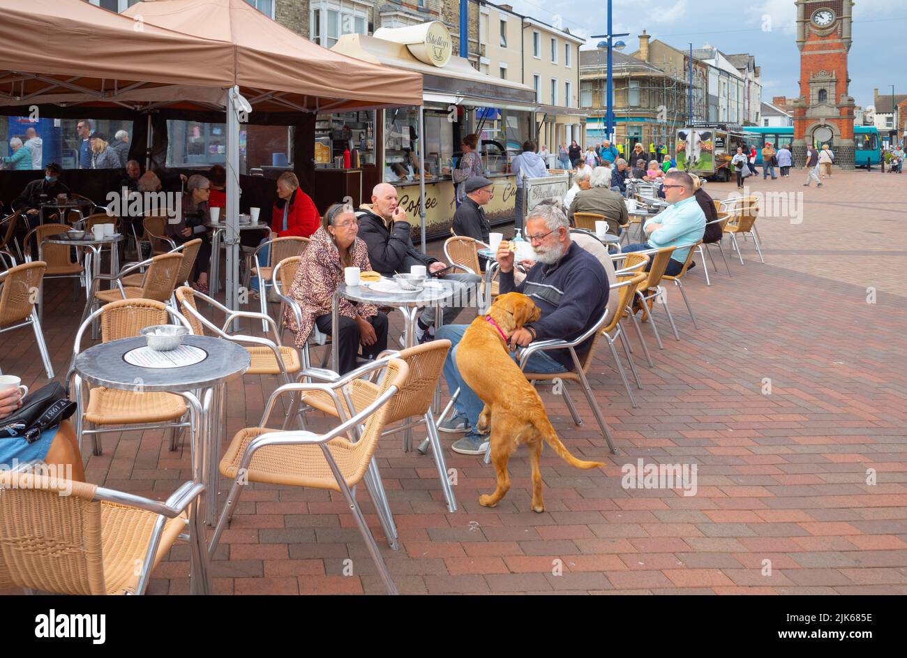 Shoppers refreshment at Shelley's café and food stall in the weekly Market Redcar High Street Cleveland England UK Stock Photo