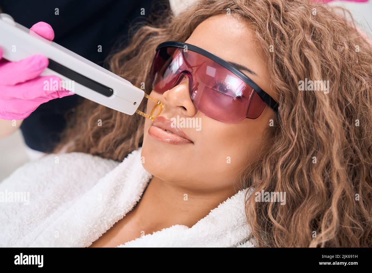 Woman on mustache laser hair removal procedure Stock Photo Alamy