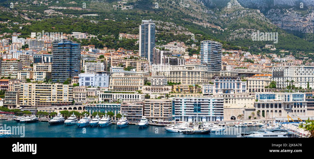 Monaco, Monte-Carlo, France - July 23, 2011 : Panorama of northern side of Monaco Harbor up against the hillside. Stock Photo