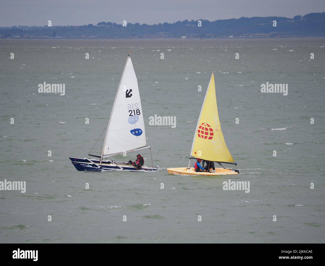 Sheerness, Kent, UK. 31st July, 2022. UK Weather: a sunny and windy morning for dinghy sailors in Sheerness, Kent. Credit: James Bell/Alamy Live News Stock Photo
