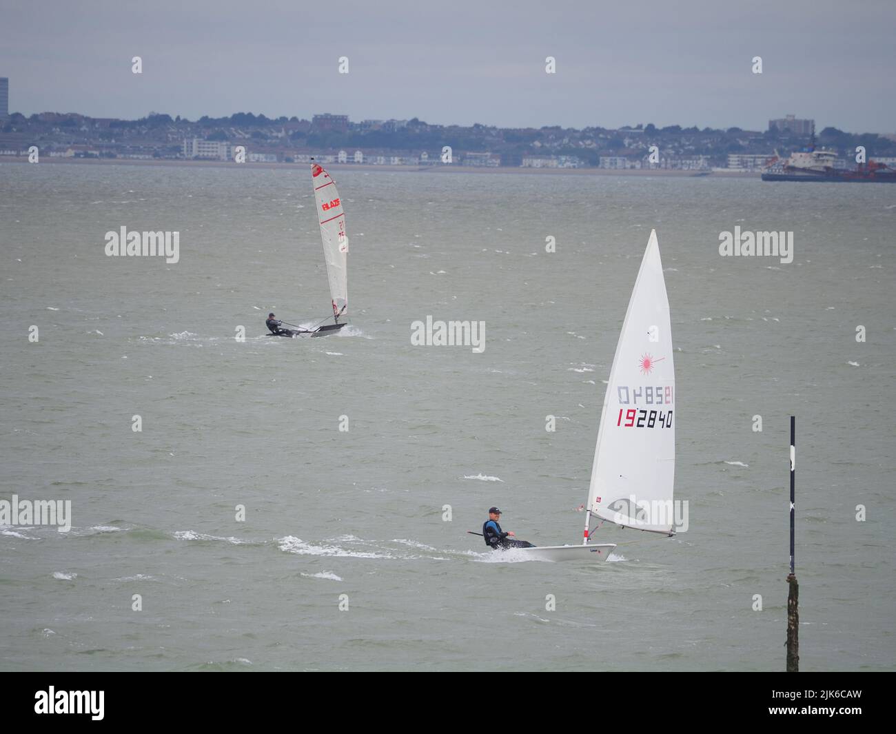 Sheerness, Kent, UK. 31st July, 2022. UK Weather: a sunny and windy morning for dinghy sailors in Sheerness, Kent. Credit: James Bell/Alamy Live News Stock Photo