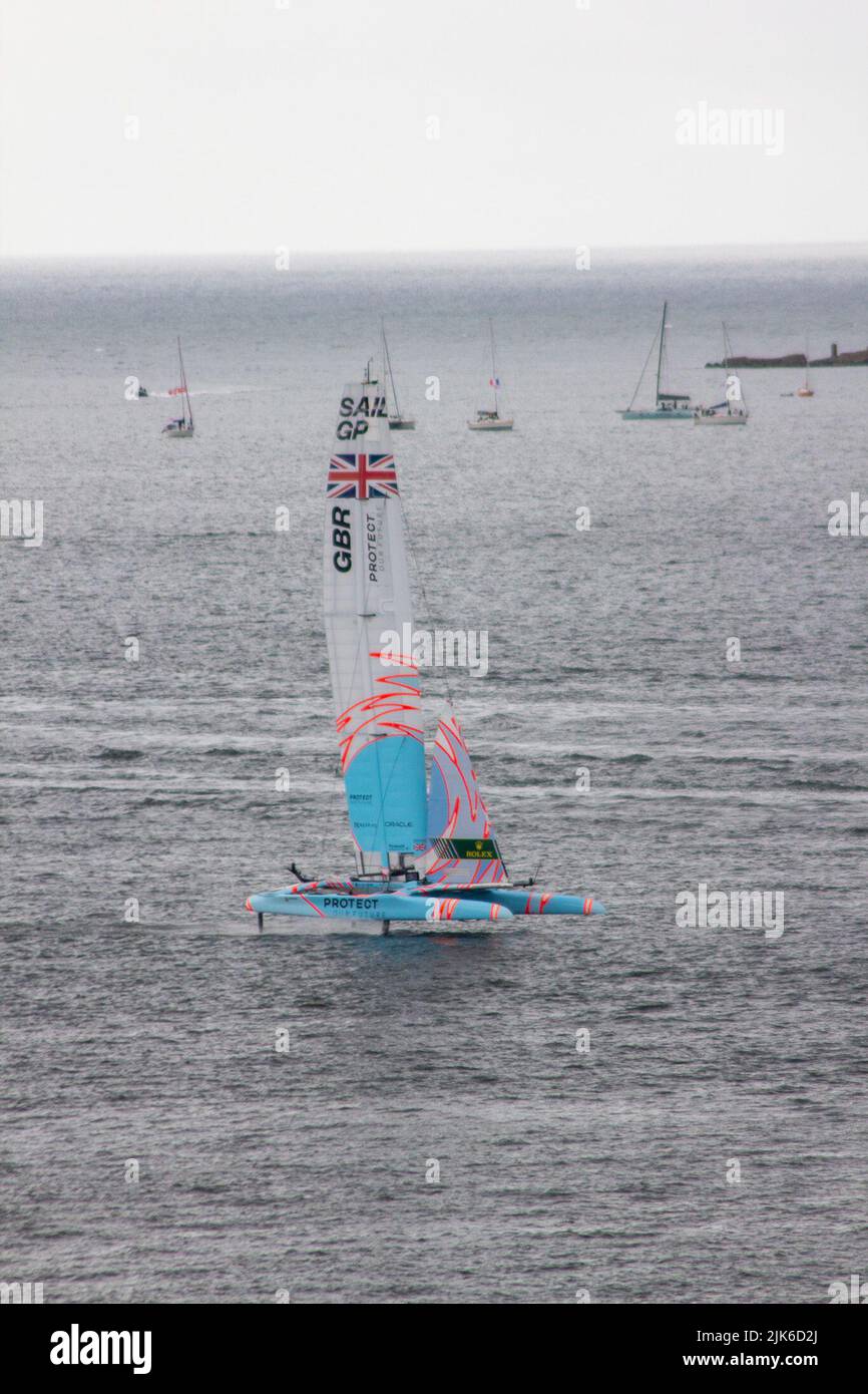 SailGP, Plymouth, UK. 31st July, 2022. HRH Duchess of Cambridge on helm with Ben Ainslie go to win the Commonwealth race against New Zealand. Final day for the Great British Sail Grand Prix, as Britain's Ocean City hosts the third event of Season 3 as the most competitive racing on water. The event returns to Plymouth on 30-31 July. Credit: Julian Kemp/Alamy Live News Stock Photo