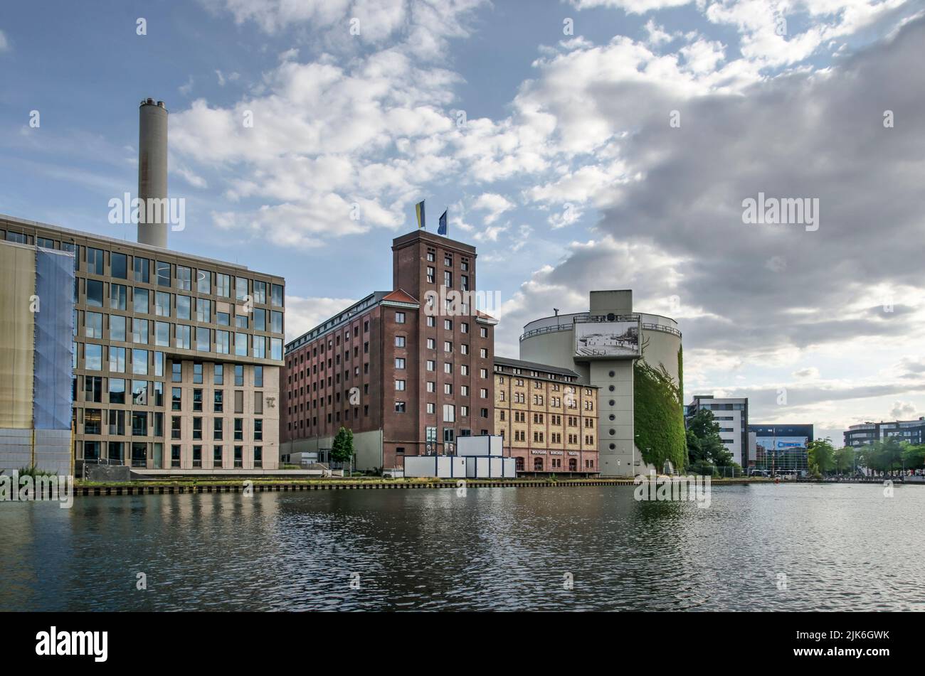 Münster, Germany, July 27, 2022: a mixture of old and new buildings in the redeveloped harbour district Stock Photo