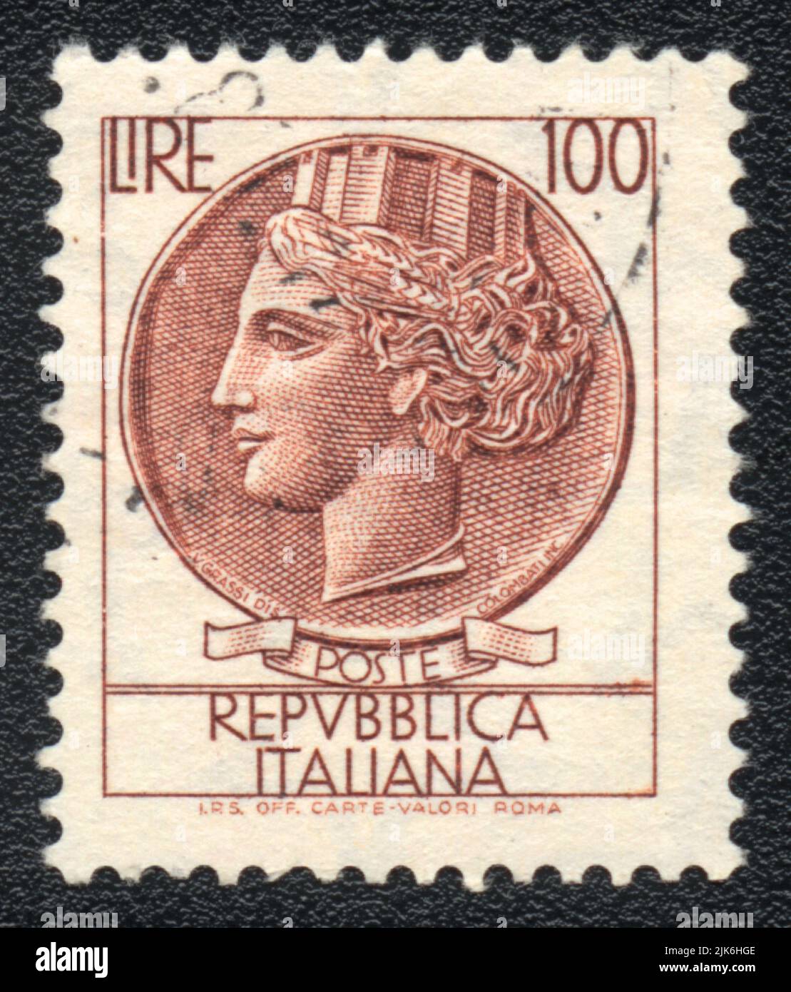 A stamp printed in Italy shows  Woman head, post office Italian Republic, brown on white, 100 Lire, circa 1971 Stock Photo