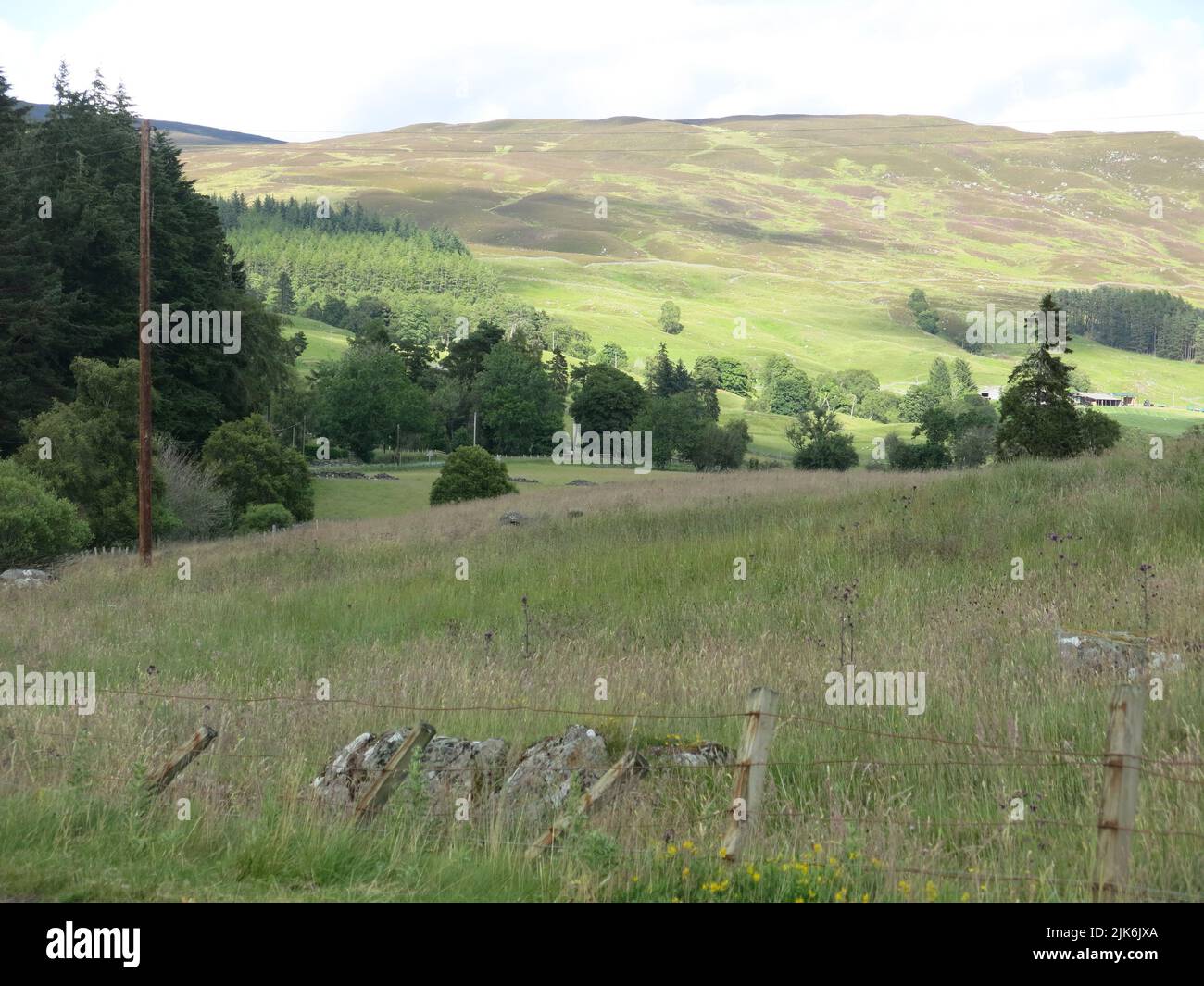 The gentle Highlands scenery of the glens of Strathardle in central Perthshire: take a road trip along the A924 between Blairgowrie and Pitlochry. Stock Photo