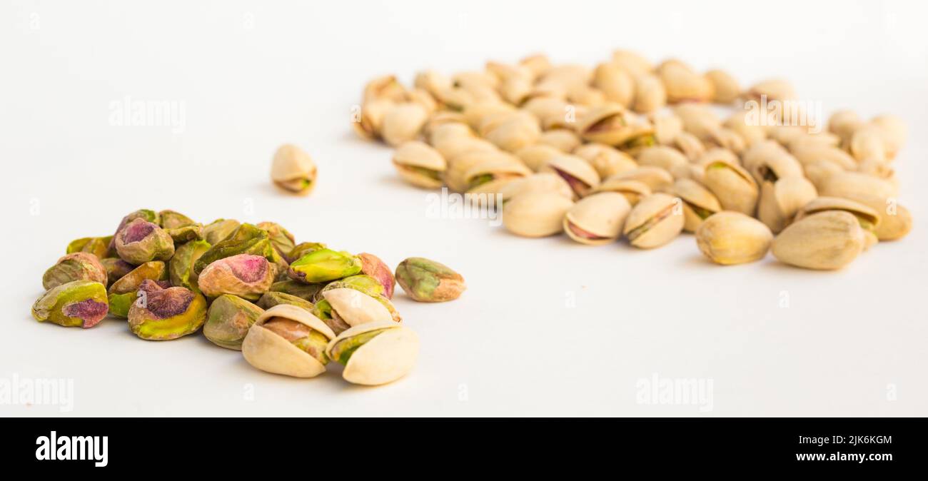 roasted pistachios on white background Stock Photo Alamy