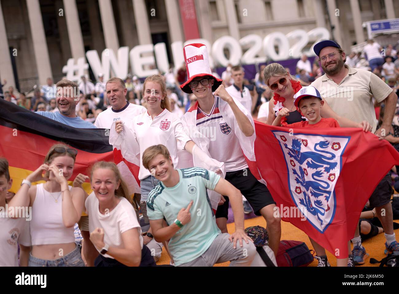 England and Germany fans in Trafalgar Square, London before a screening of the UEFA Women's Euro 2022 final held at Wembley Stadium, London. Picture date: Sunday July 31, 2022. Stock Photo
