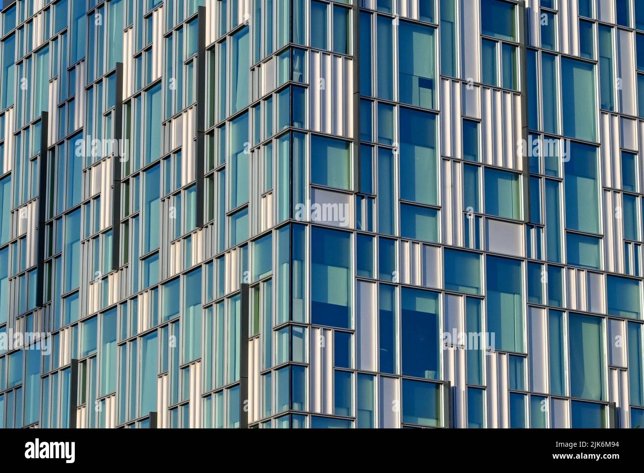 London, England - June 2022: Pattern formed by external cladding on a building near the O2 Arena in London's Docklands Stock Photo