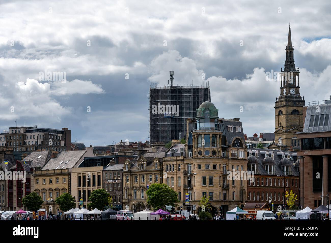 NEWCASTLE, ENGLAND - JULY 3rd, 2022: View of some beautiful buildings of Quayside and of All Saints church tower, Northumberland Stock Photo