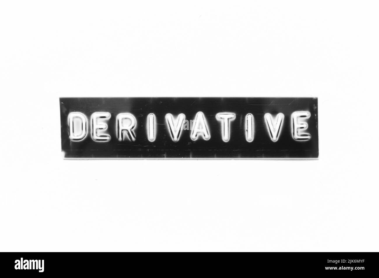 Embossed letter with word derivative in black banner on white paper