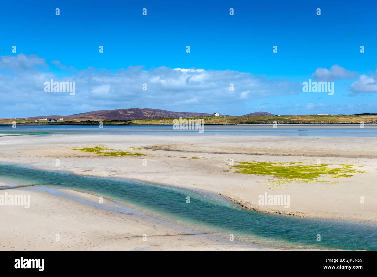 The mainland of North Uist seen from the island of Baleshare, Outer Hebrides, Scotland Stock Photo