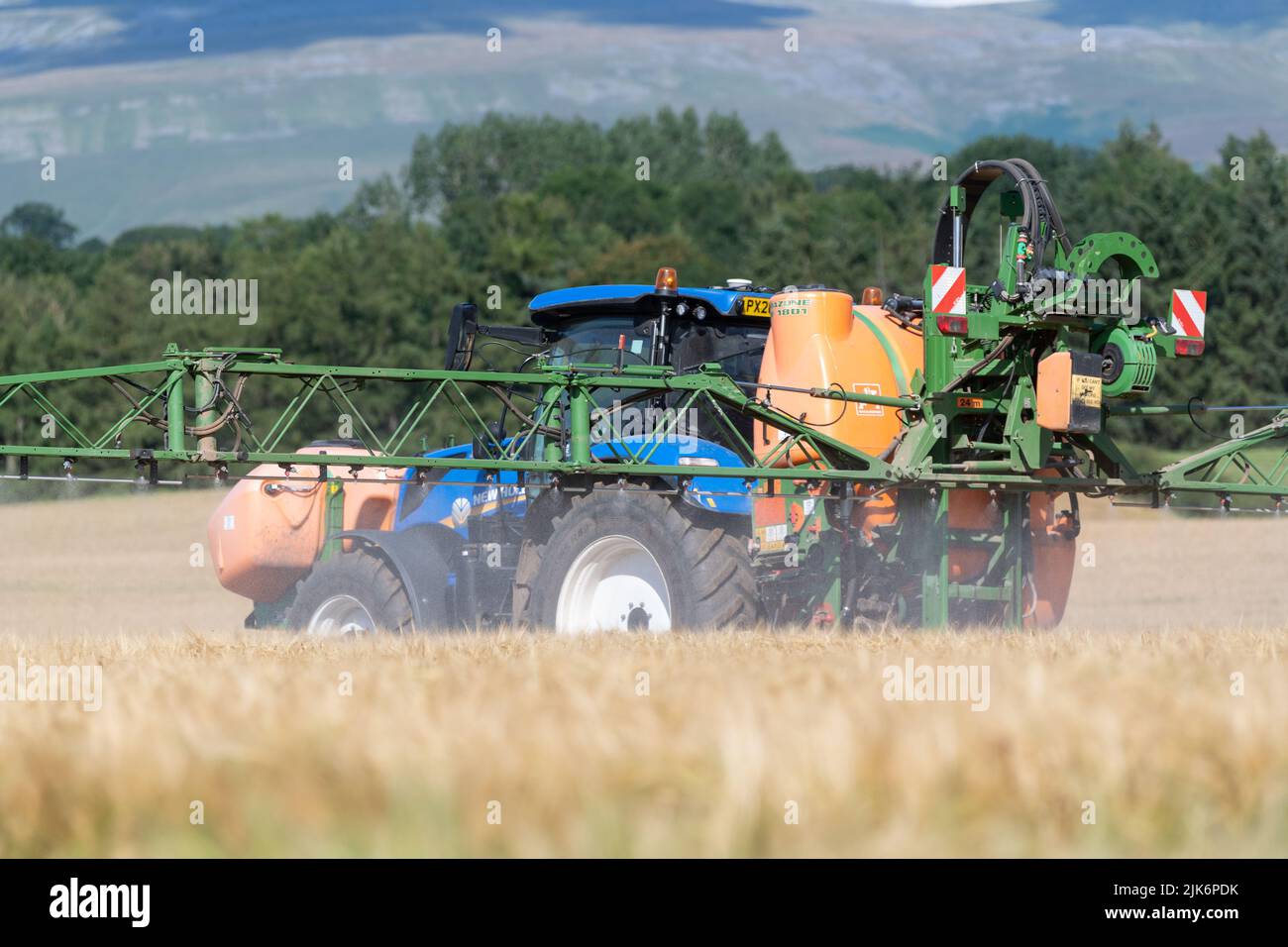 Spraying a field of nearly ripe barley with a glyphosate based