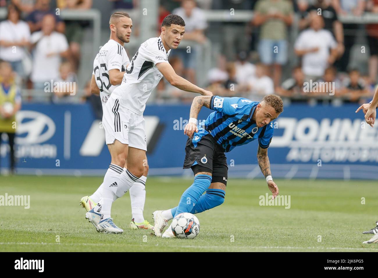 Belgium. 31st July, 2022. Eupen's Isaac Christie-Davies and Club's Noa Lang fight for the ball during a soccer match between KAS Eupen and Club Brugge KV, Sunday 31 July 2022 in Eupen, on day 2 of the 2022-2023 'Jupiler Pro League' first division of the Belgian championship. BELGA PHOTO BRUNO FAHY Credit: Belga News Agency/Alamy Live News Stock Photo