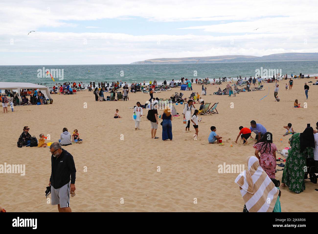 Bournemouth, Dorset, UK. 31 Jul, 2022. UK Weather: Overcast weather in Bournemouth as brits still pack the beach. Photo Credit: Paul Lawrenson /Alamy Live News Stock Photo