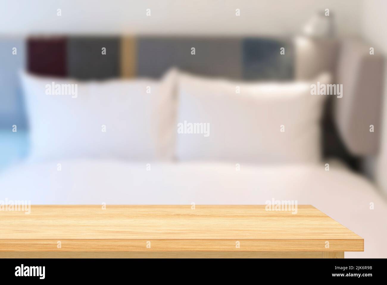 Montage tabletop with free space for designer ideas. Wooden table, shelf in a hotel room. Stock Photo