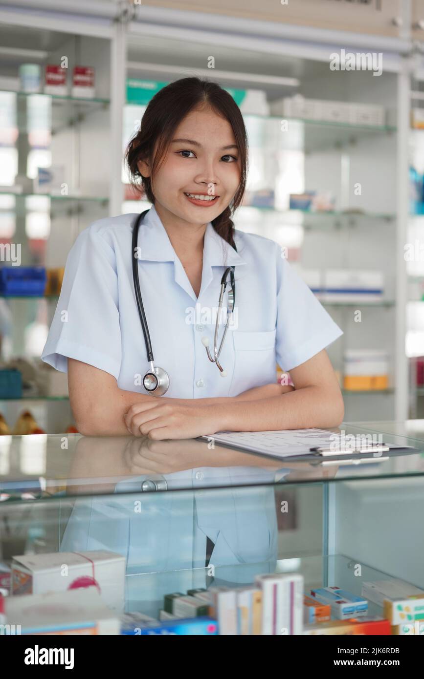 Medicine and health concept, Female pharmacist stand with crossed arms