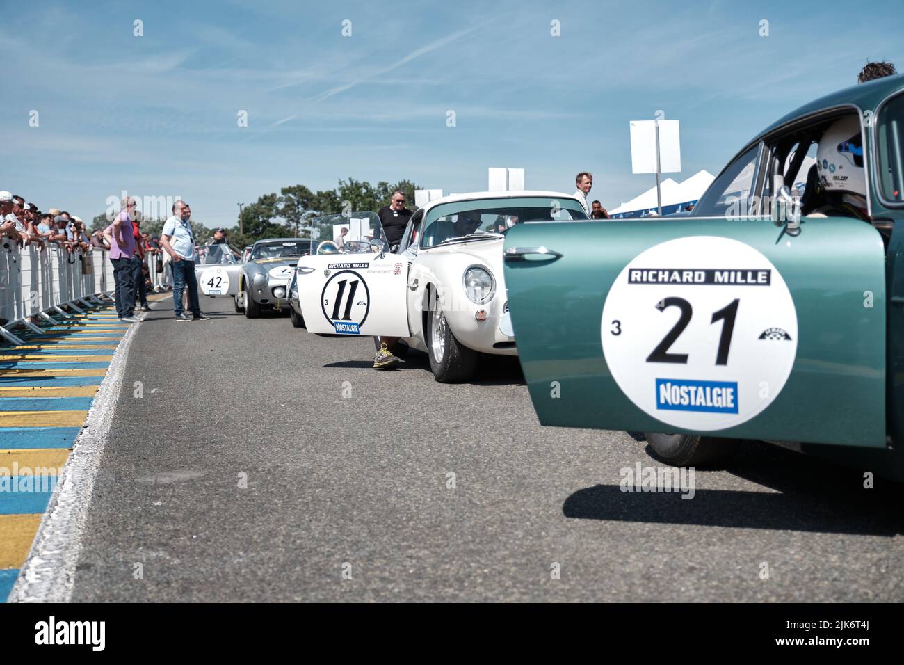 Classic race cars lined up pre race at Le Mans Stock Photo