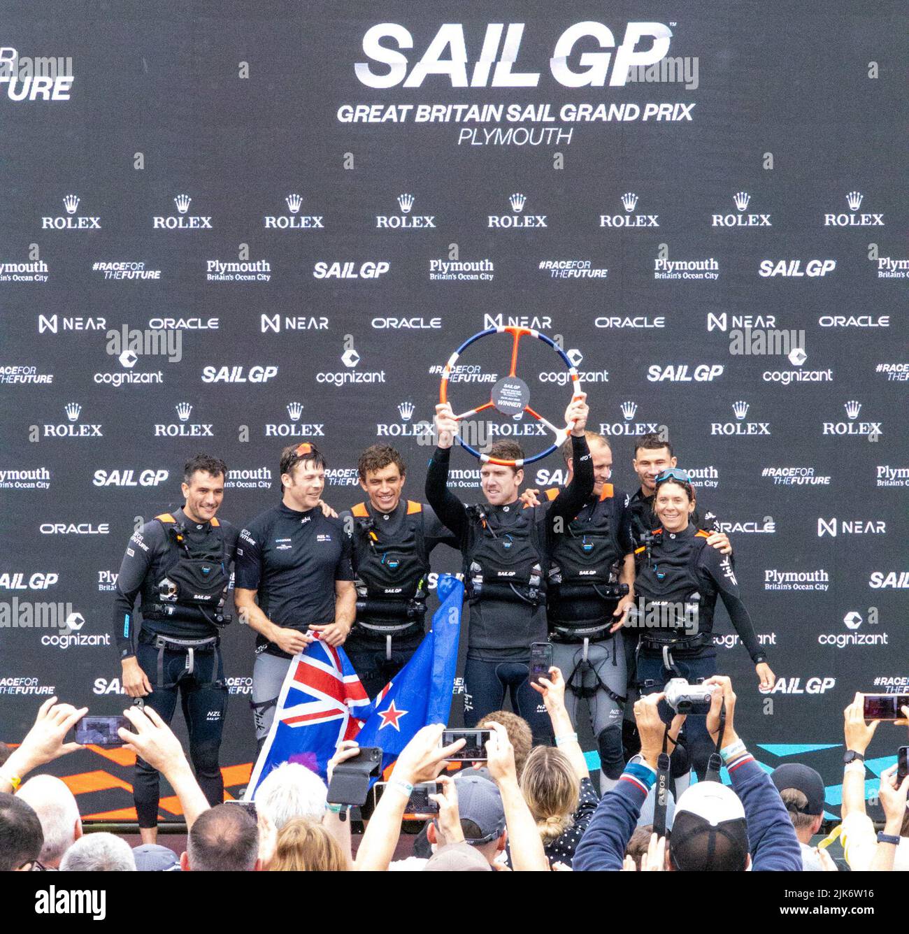 SailGP, Plymouth, UK. 31st July, 2022. New Zealand are crowned overall winners at the Final day for the Great British Sail Grand Prix. Britain's Ocean City hosts the third event of Season 3 as the most competitive racing on water. The event returns to Plymouth on 30-31 July. Credit: Julian Kemp/Alamy Live News Stock Photo
