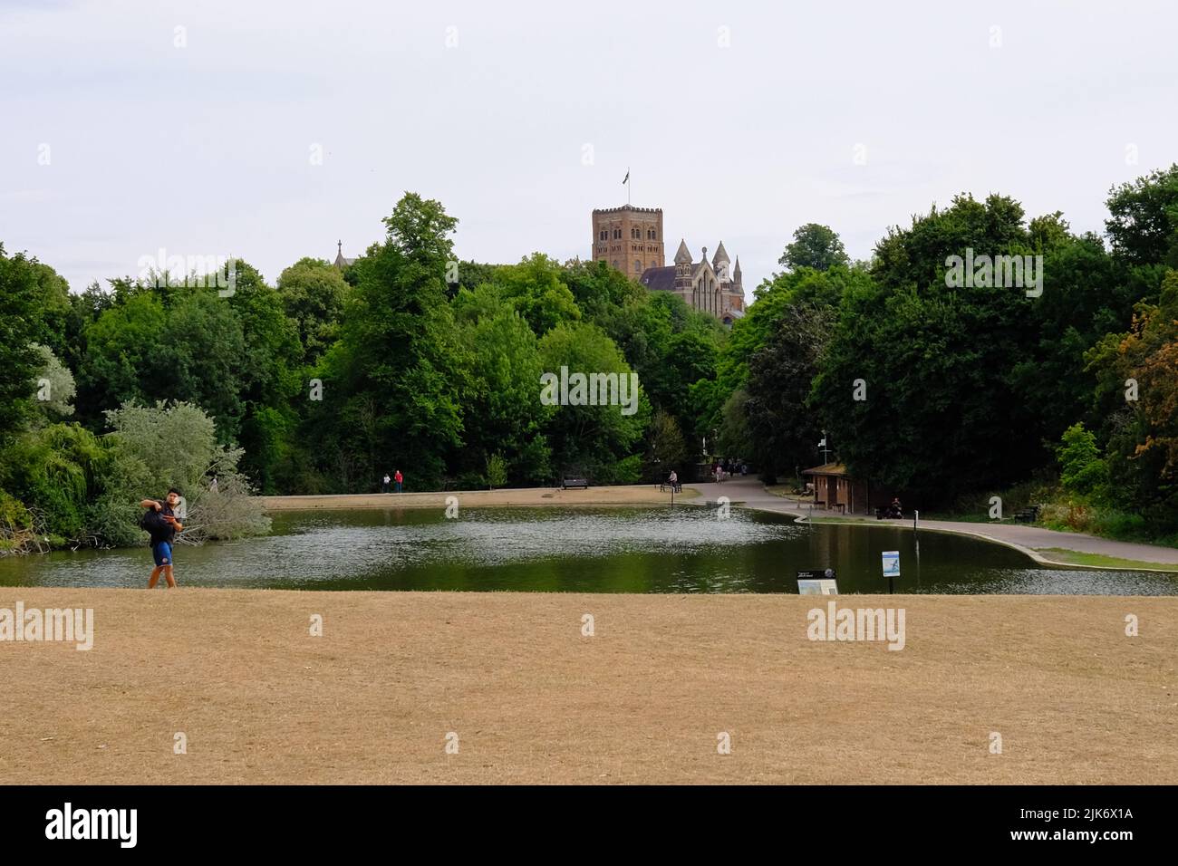 St Albans, Verulamium park and lake and a distant view of the cathedral, Hertfordshire Stock Photo