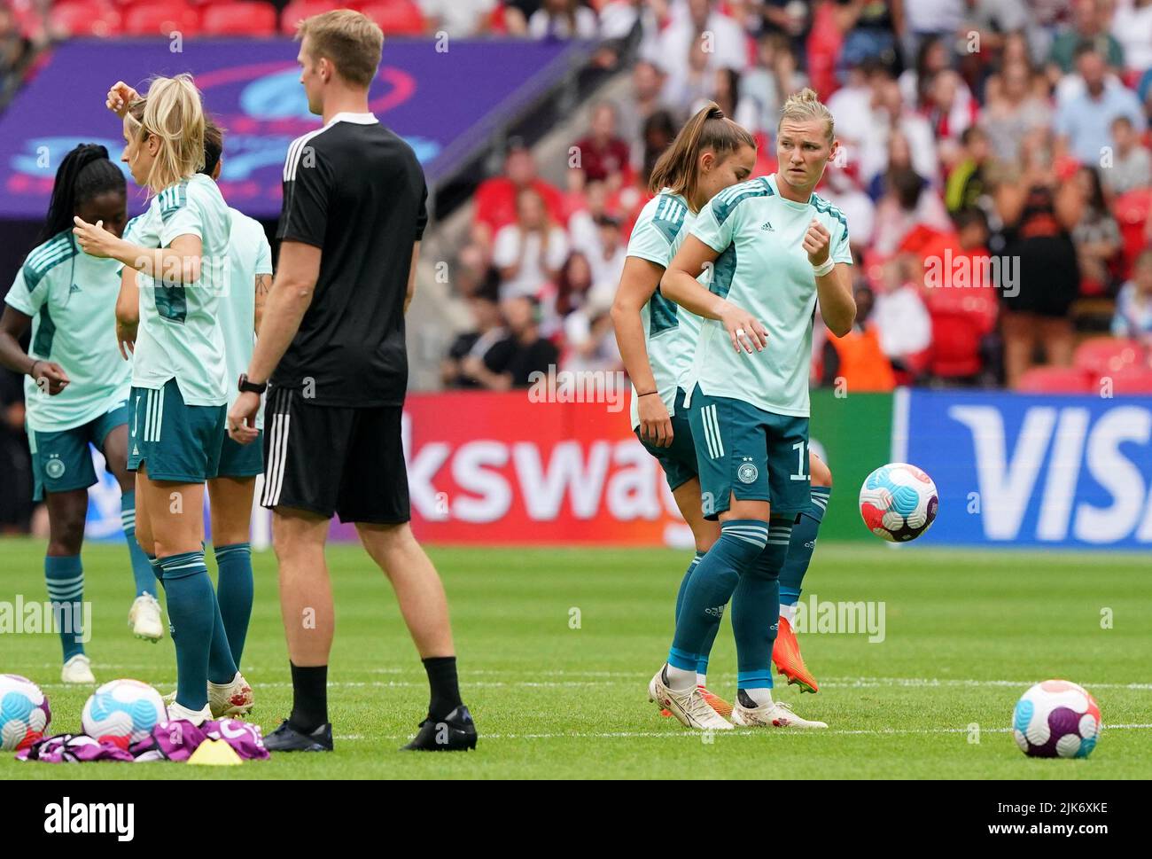 Germany's Alexandra Popp (right) and team-mates warming up before the UEFA Women's Euro 2022 final at Wembley Stadium, London. Picture date: Sunday July 31, 2022. Stock Photo