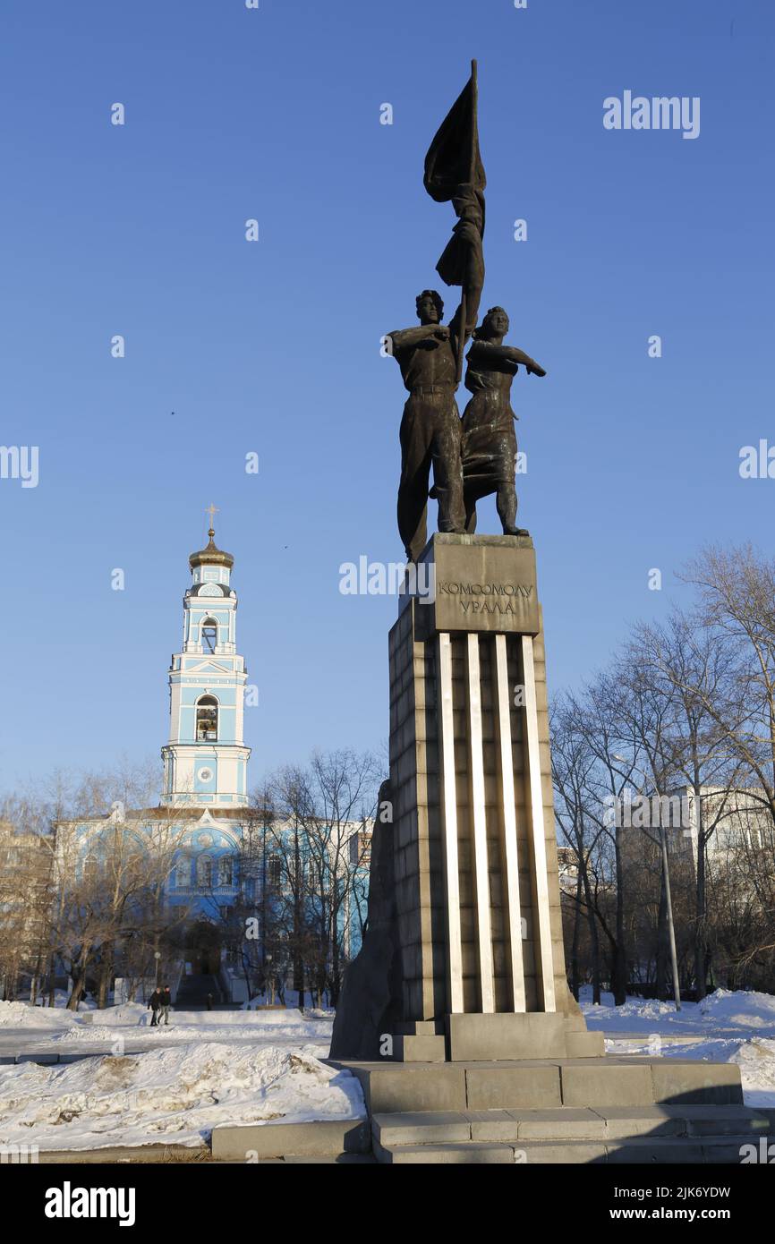 Monument to Ural Komsomol in Ekaterinburg, Russia with the Ascension church in the background Stock Photo