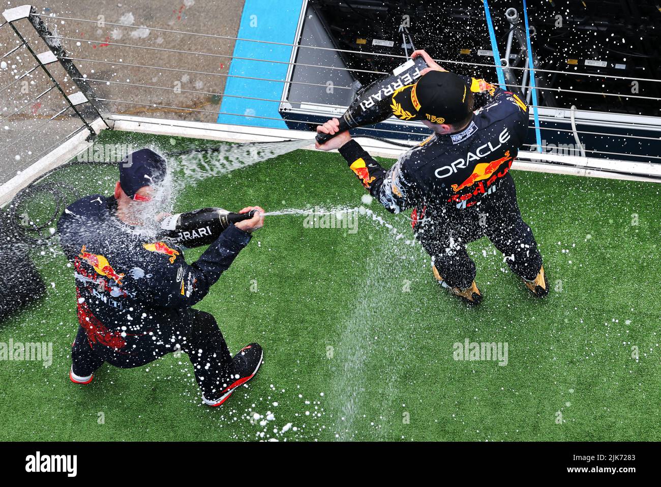 Race winner Max Verstappen (NLD) Red Bull Racing celebrates with Adrian Newey (GBR) Red Bull Racing Chief Technical Officer on the podium. Hungarian Grand Prix, Sunday 31st July 2022. Budapest, Hungary. Stock Photo