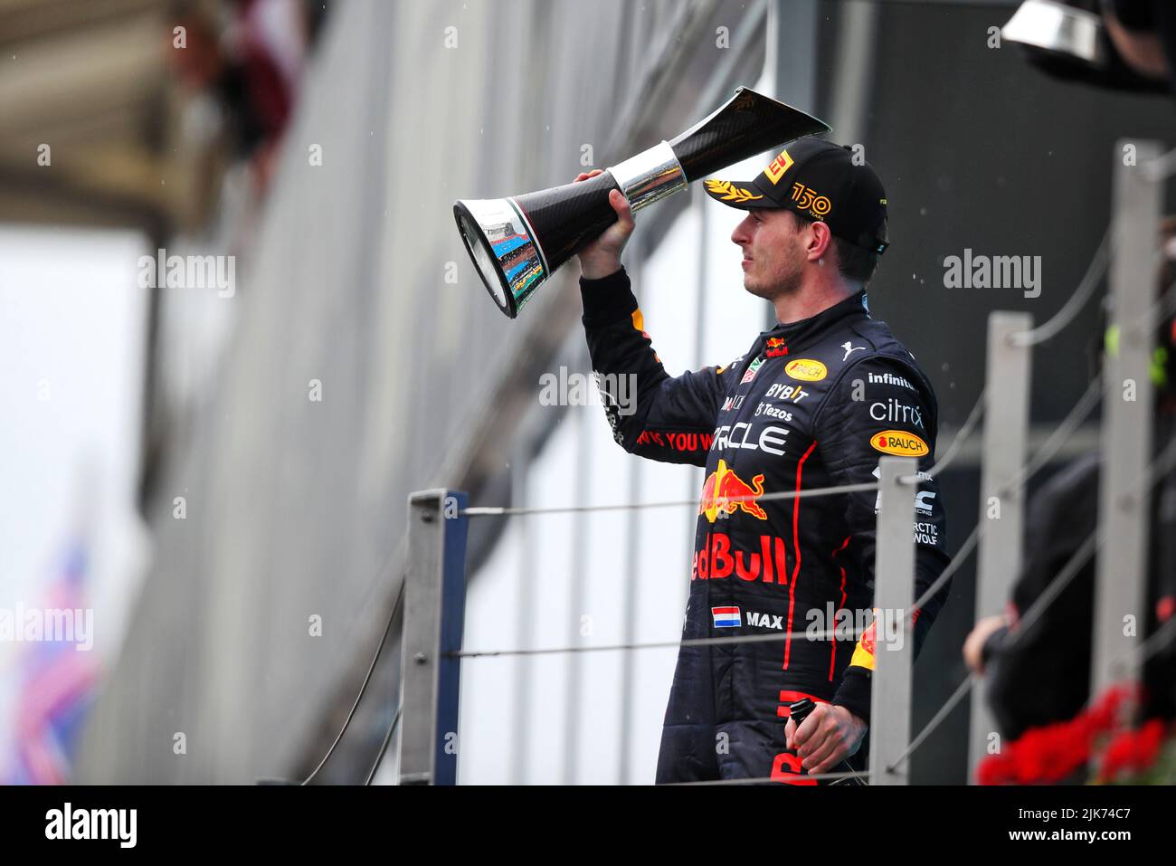 Race winner Max Verstappen (NLD) Red Bull Racing celebrates on the podium. Hungarian Grand Prix