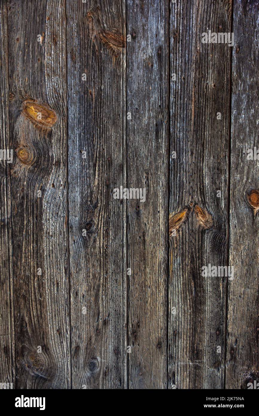 Old wooden planks nailed to a door Stock Photo