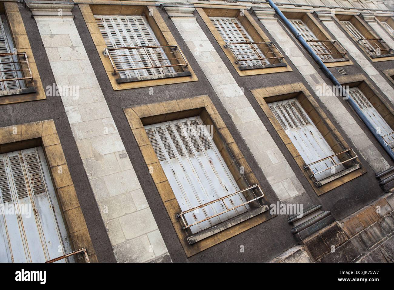 Facade of a dirty building in the city Stock Photo