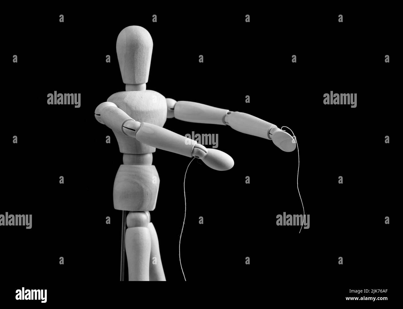 Puppet under manipulation control concept. High quality photo Stock Photo