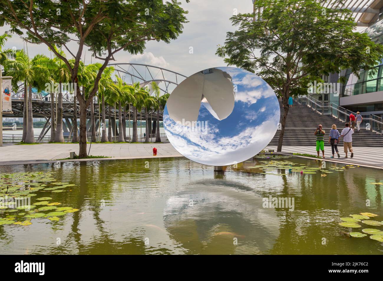 Sky Mirror, by British-Indian sculptor Anish Kapoor, b. 1954, Republic of Singapore.  It shows a partial reflection of the neighouring ArtScience Muse Stock Photo