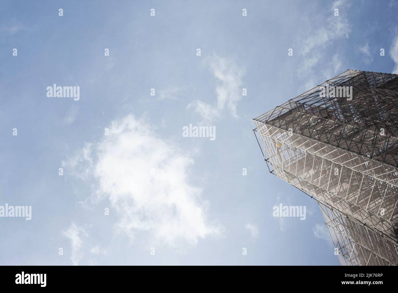Scaffolding and blue sky on background Stock Photo