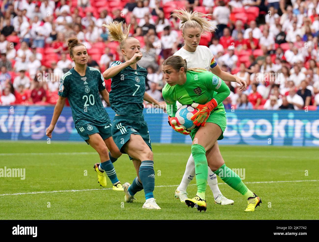 England goalkeeper Mary Earps collects the ball ahead of Germany's Lea Schuller during the UEFA Women's Euro 2022 final at Wembley Stadium, London. Picture date: Sunday July 31, 2022. Stock Photo