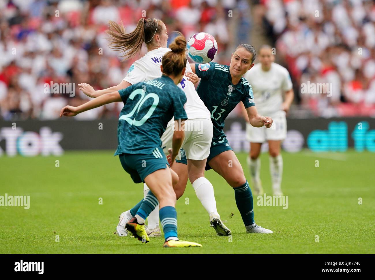 England's Keira Walsh (centre) in action with Germany's Sara Dabritz (right) and Lina Magull during the UEFA Women's Euro 2022 final at Wembley Stadium, London. Picture date: Sunday July 31, 2022. Stock Photo