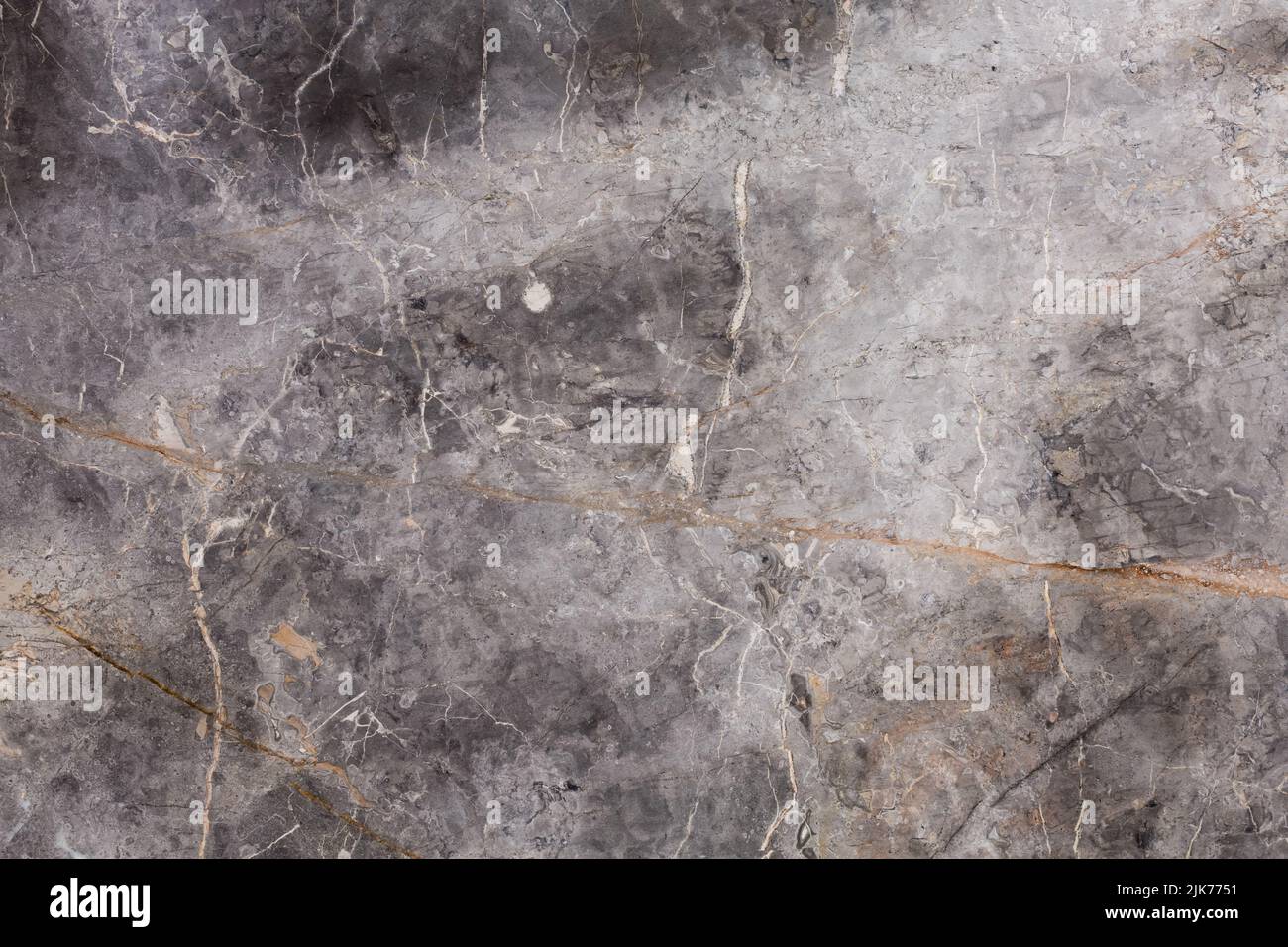 Orange patterned detailed of dark gray marble texture for interior. Stock Photo