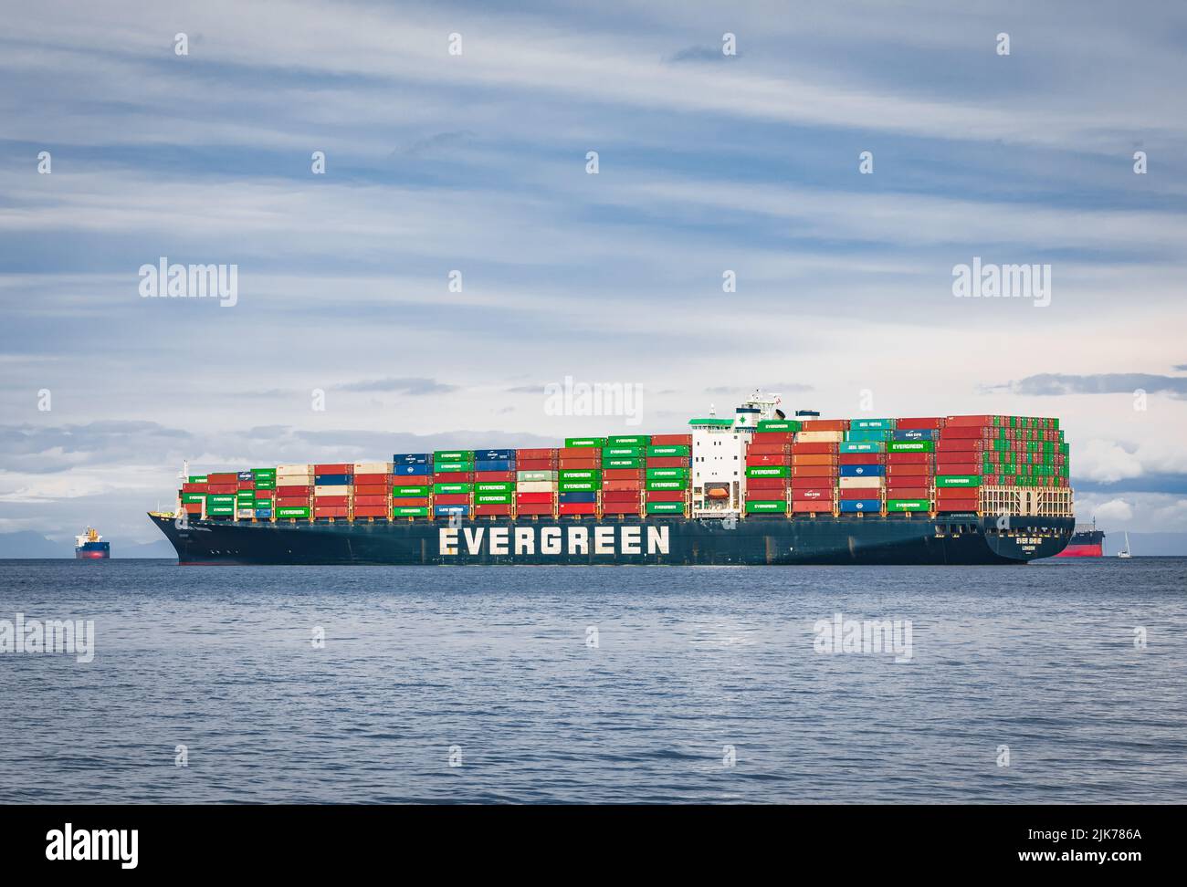 Evergreen container ship with full of cargo docked in port at Vancouver